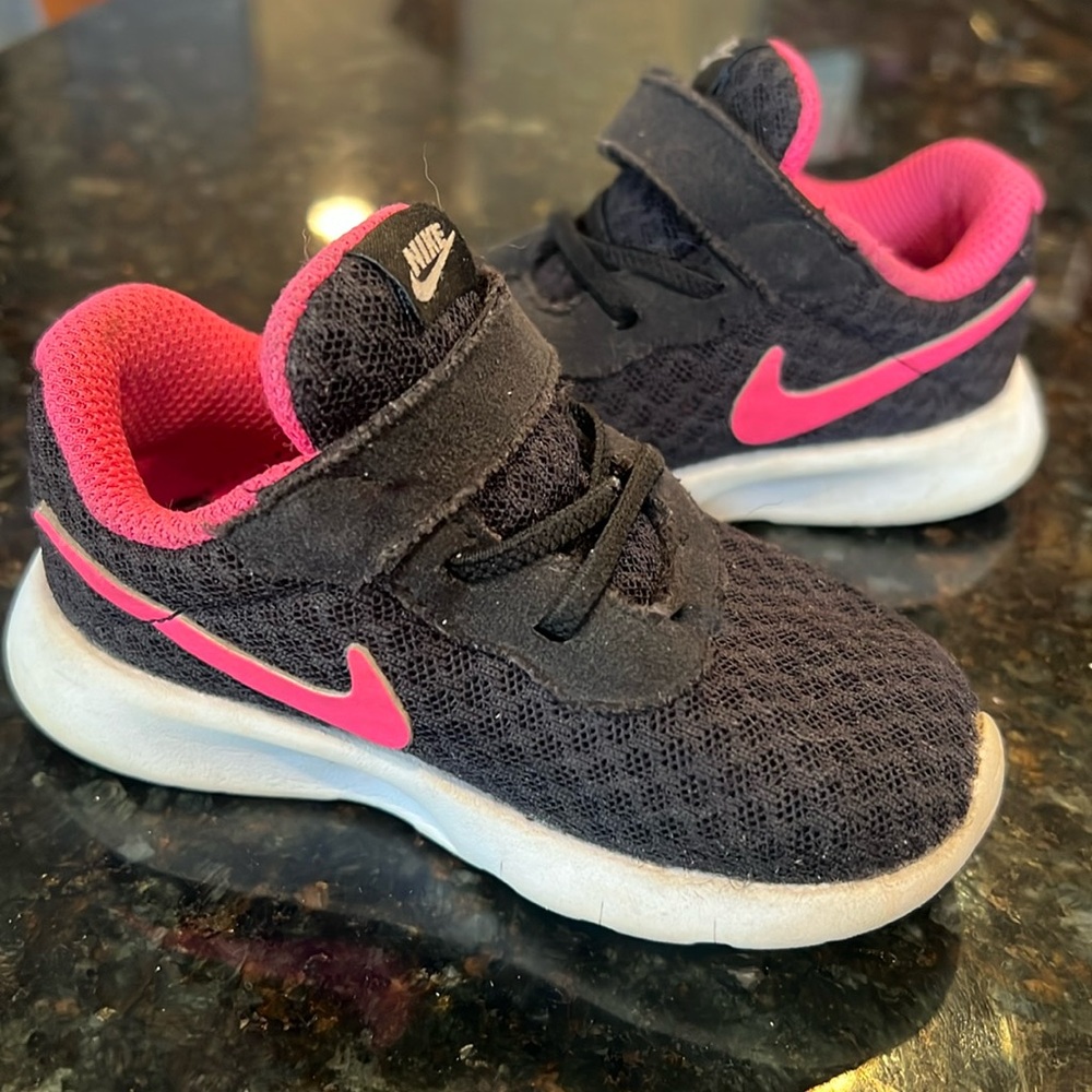 Toddler girl Nike tennis shoes, size 5